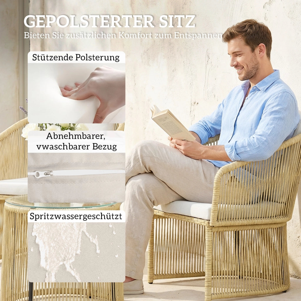 Set bistrot in rattan a 3 pezzi: tavolo rotondo di vetro; poltrone e cuscini; crema bianca