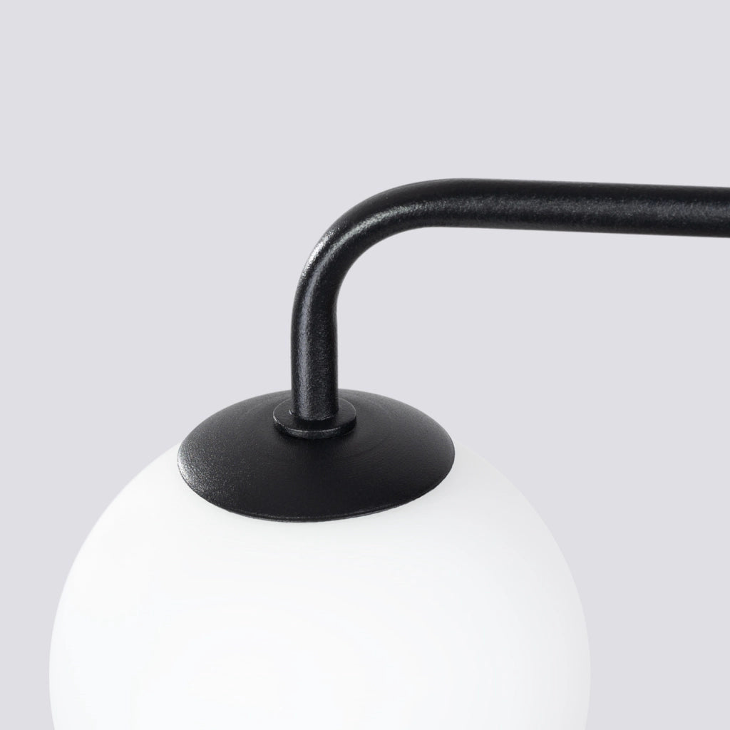 Applique nera metallo vetro sfera bianca G9 KOSMOS