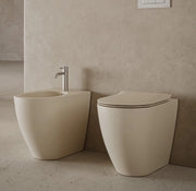 Bidet filomuro - Centrica - Hatria Colori Hatria Sanitari: Terre di Siena lucido