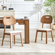 Set di 2 sedie da pranzo 95.5x35.5x54 cm con schienale ovale; seduta imbottita in legno e PU bianco