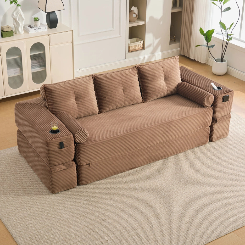 Divano letto modulare con cuscini memory, tasche laterali e portabicchieri in velluto a coste marrone per casa