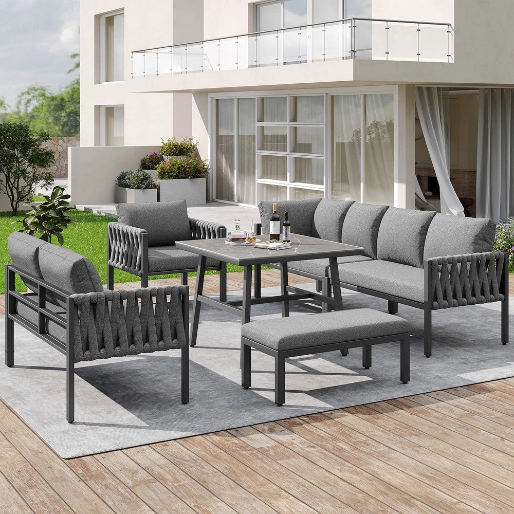 Set Divano da Giardino Angolare con Tavolo in Vetro ¨C Xylo ¨C Polyrattan, Cuscini Inclusi, Grigio