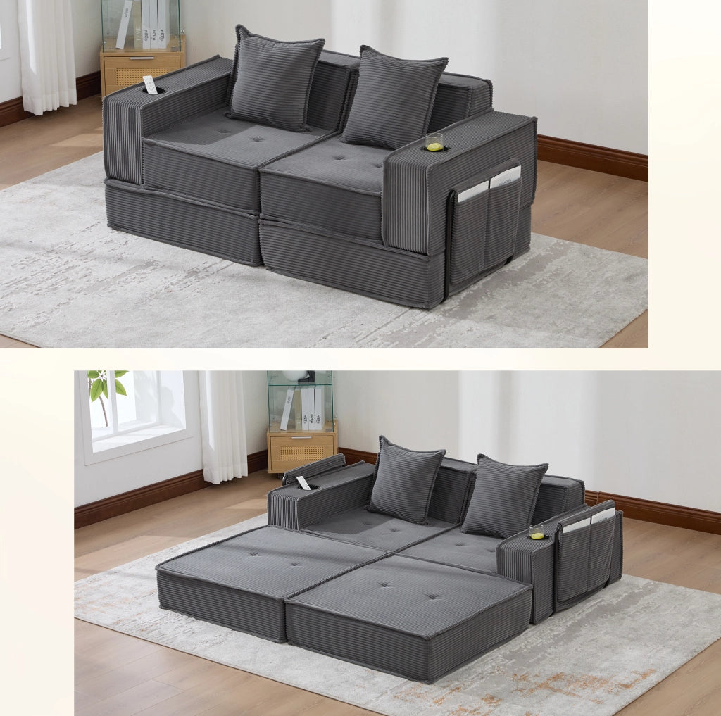 Pouf sofa modulare grigio scuro in velluto a coste con cuscini e tasche laterali