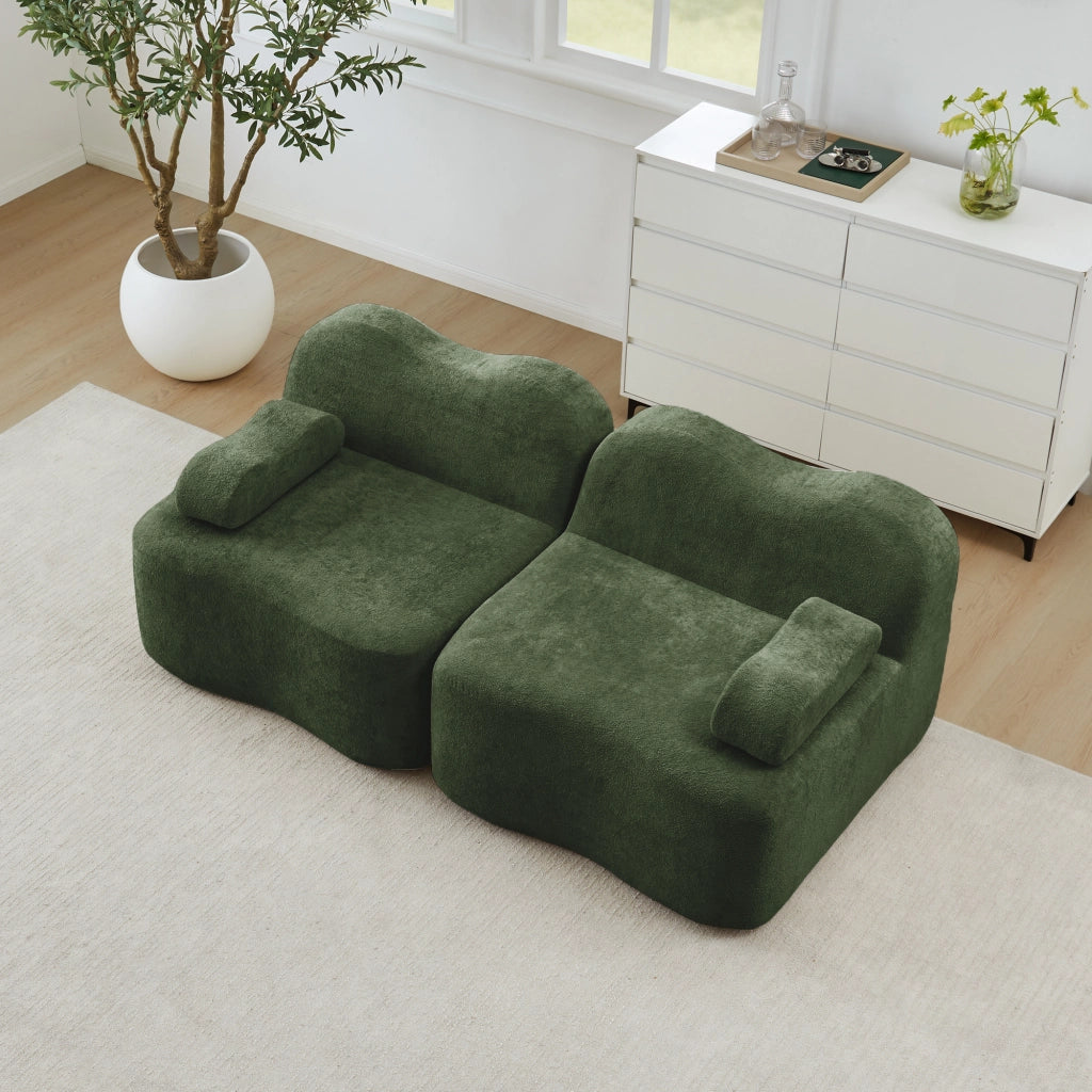 DIVANO MODULARE senza struttura, forma ondulata, in velluto verde