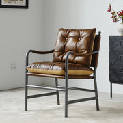 Poltrona accent in pelle stile Mid Century Modern marrone con struttura in metallo