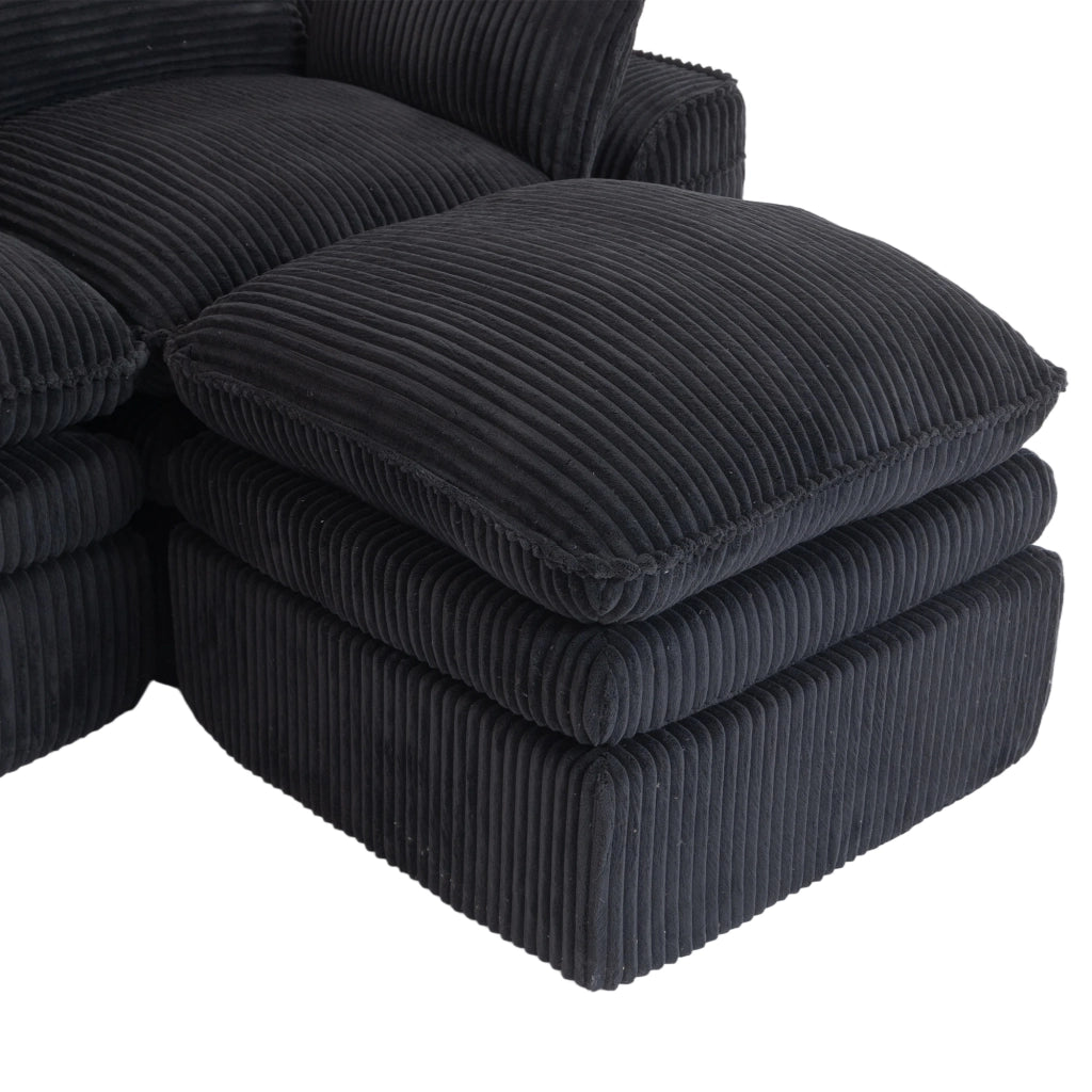 Divano modulare 3 posti in corduroy nero con pouf, tasche laterali e struttura a molle