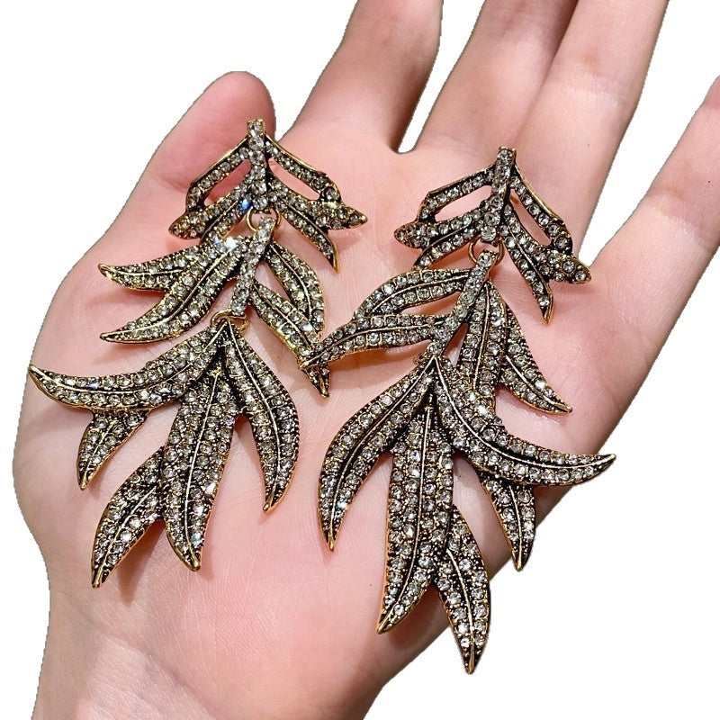 Orecchini vintage a foglia con diamanti