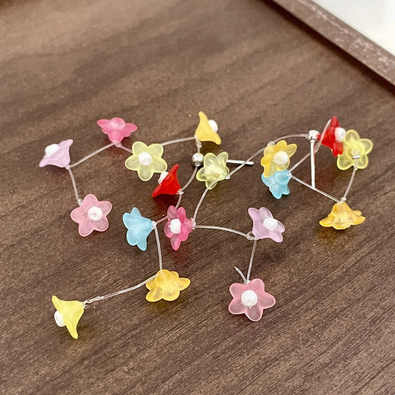 Orecchini colorati a forma di fiore di dopamina con perline