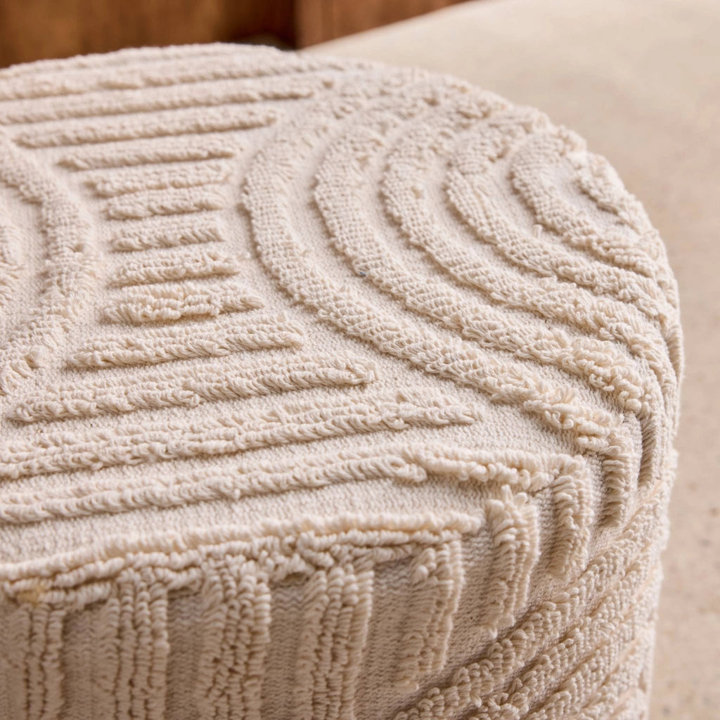 Pouf rotondo in bouclé testurizzato, bianco