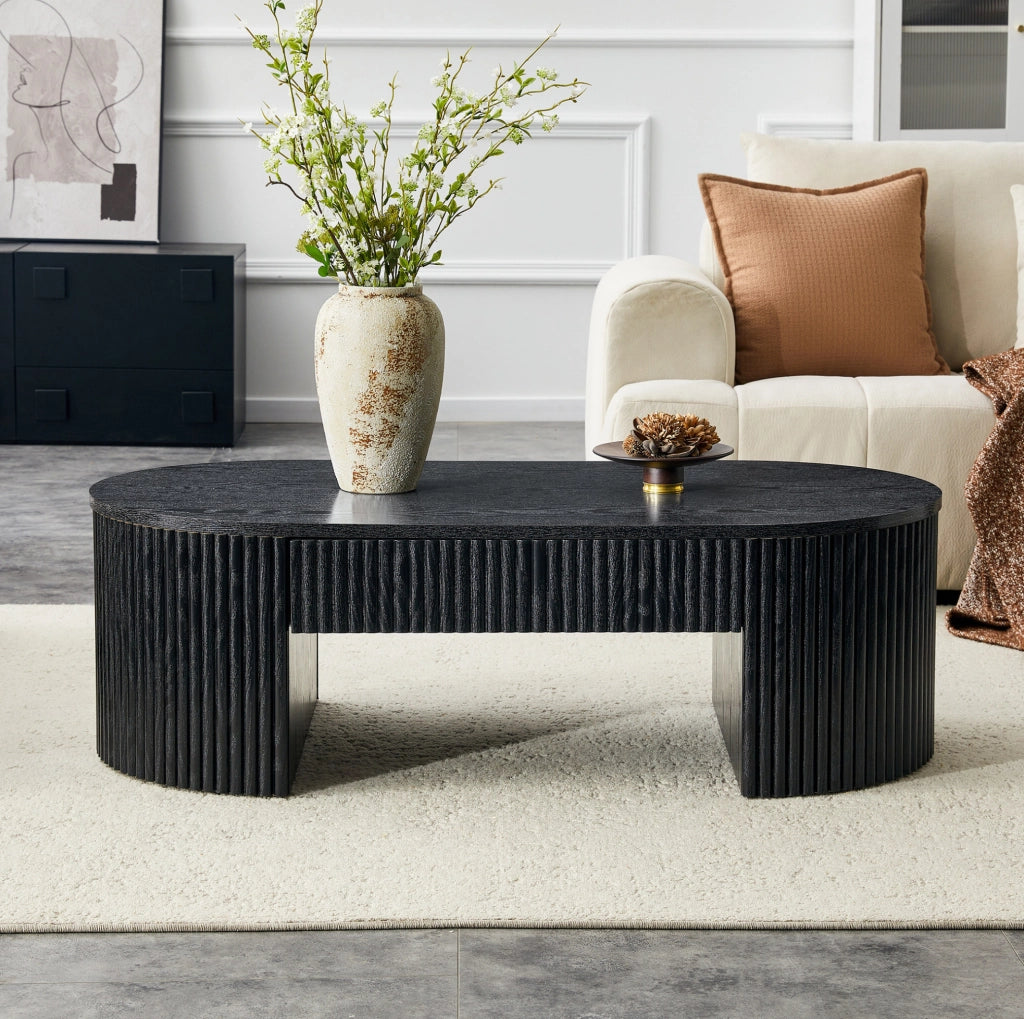 Tavolino da caffè ovale 118x65x17 cm con cassetto estraibile e scanalature verticali in MDF nero