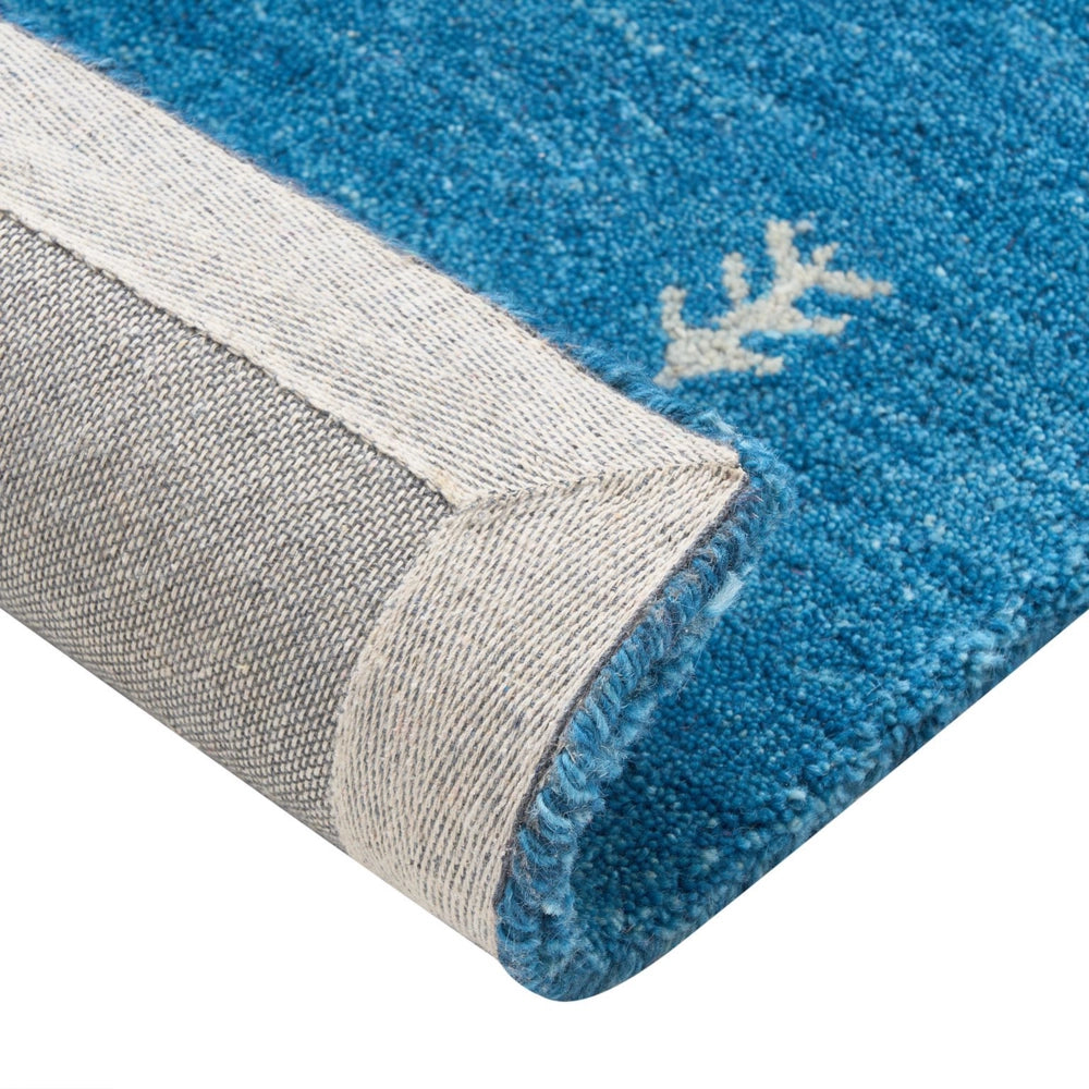 Tappeto Gabbeh in lana blu 140 x 200 cm, trapuntato a mano con motivi animali occidentali e design rustico