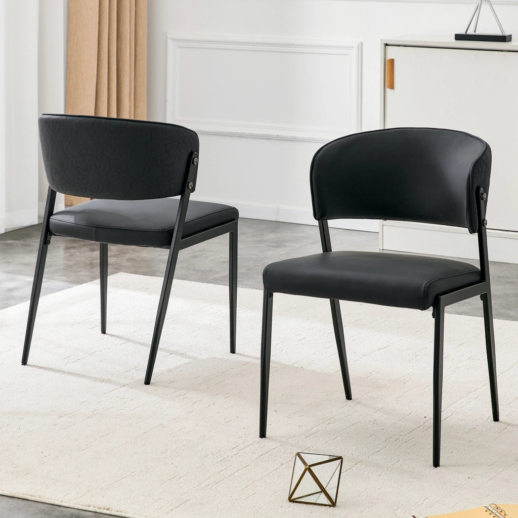Sedia da pranzo moderna in PU nero con struttura in metallo e schienale ergonomico