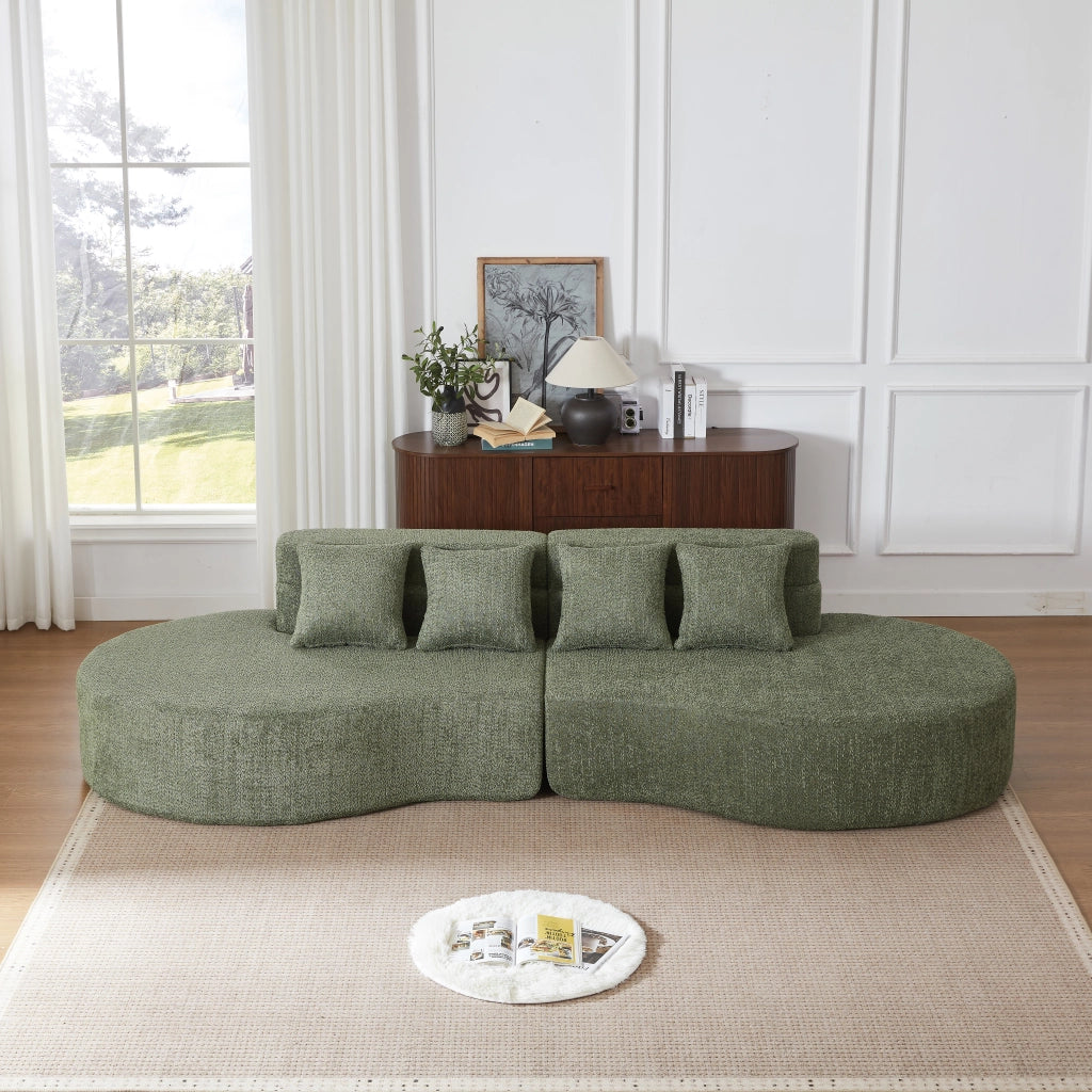 Divano modulare in schiuma con design curvo e schienale a strati, divisibile in due, rivestimento in ciniglia verde