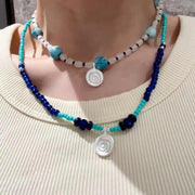 Collana con ciondolo a forma di conchiglia in pietra naturale: gioielli boho con perline