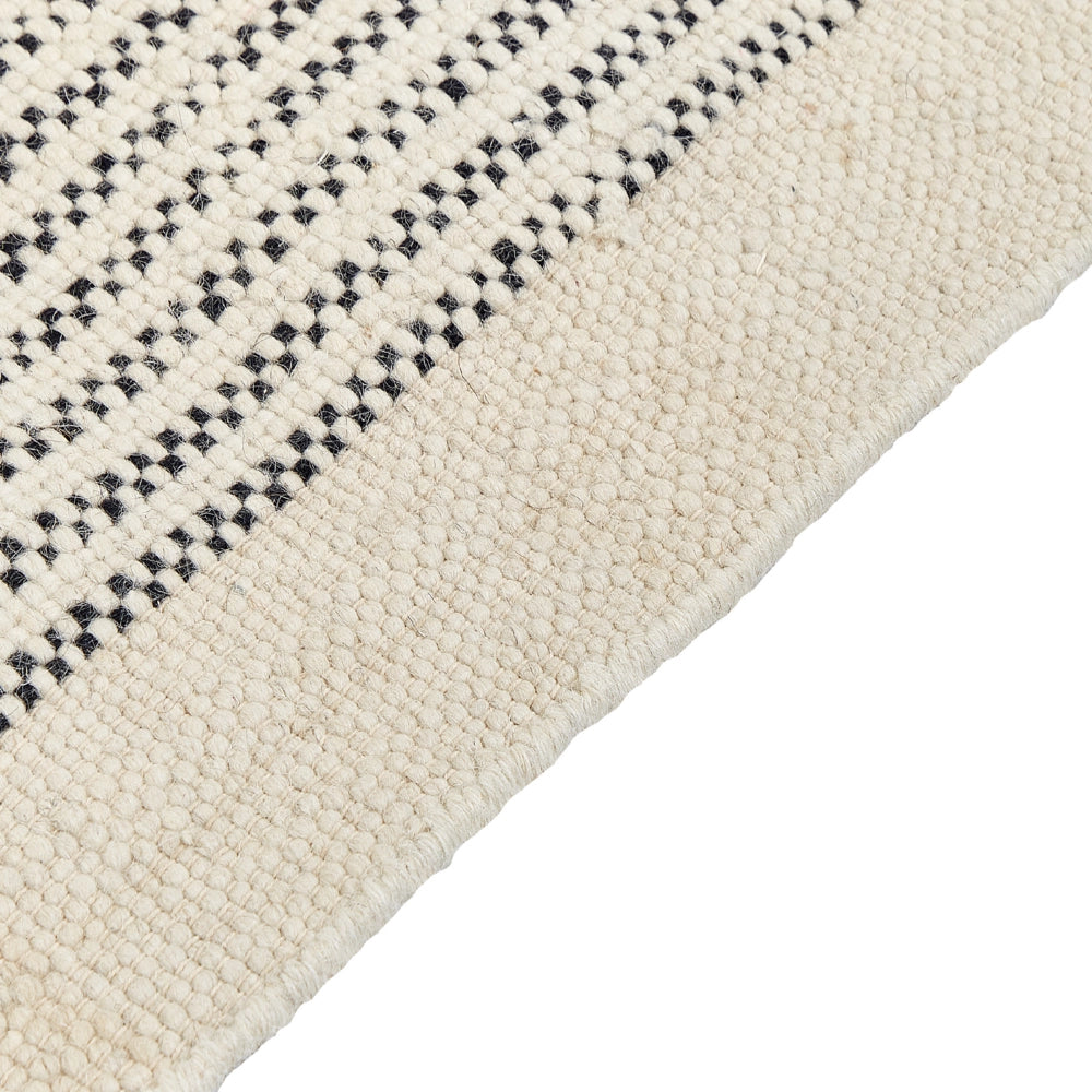 Tappeto beige e nero lana cotone 140 x 200 cm intrecciato a mano rettangolare con frange