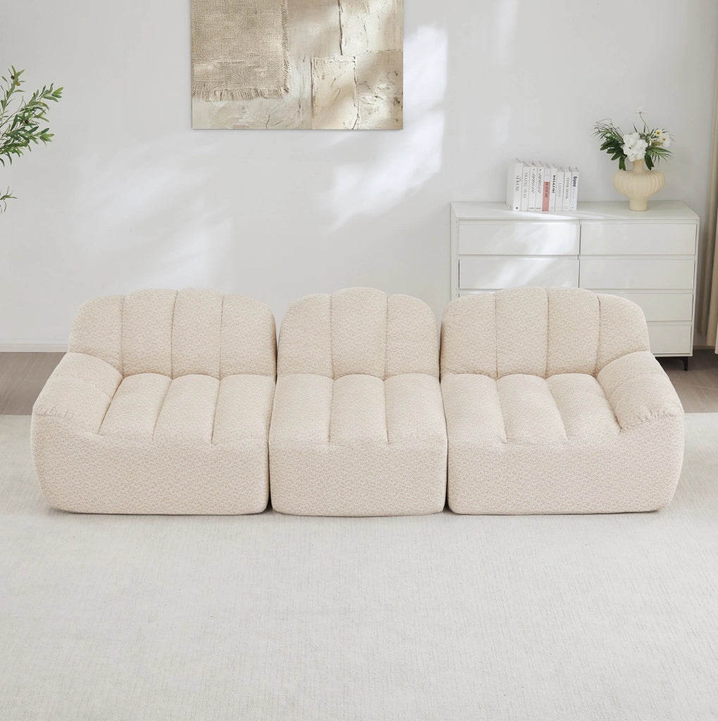 Divano modulare 2-4 posti con ottomano in pile granulato e schiuma 32D; beige bianco