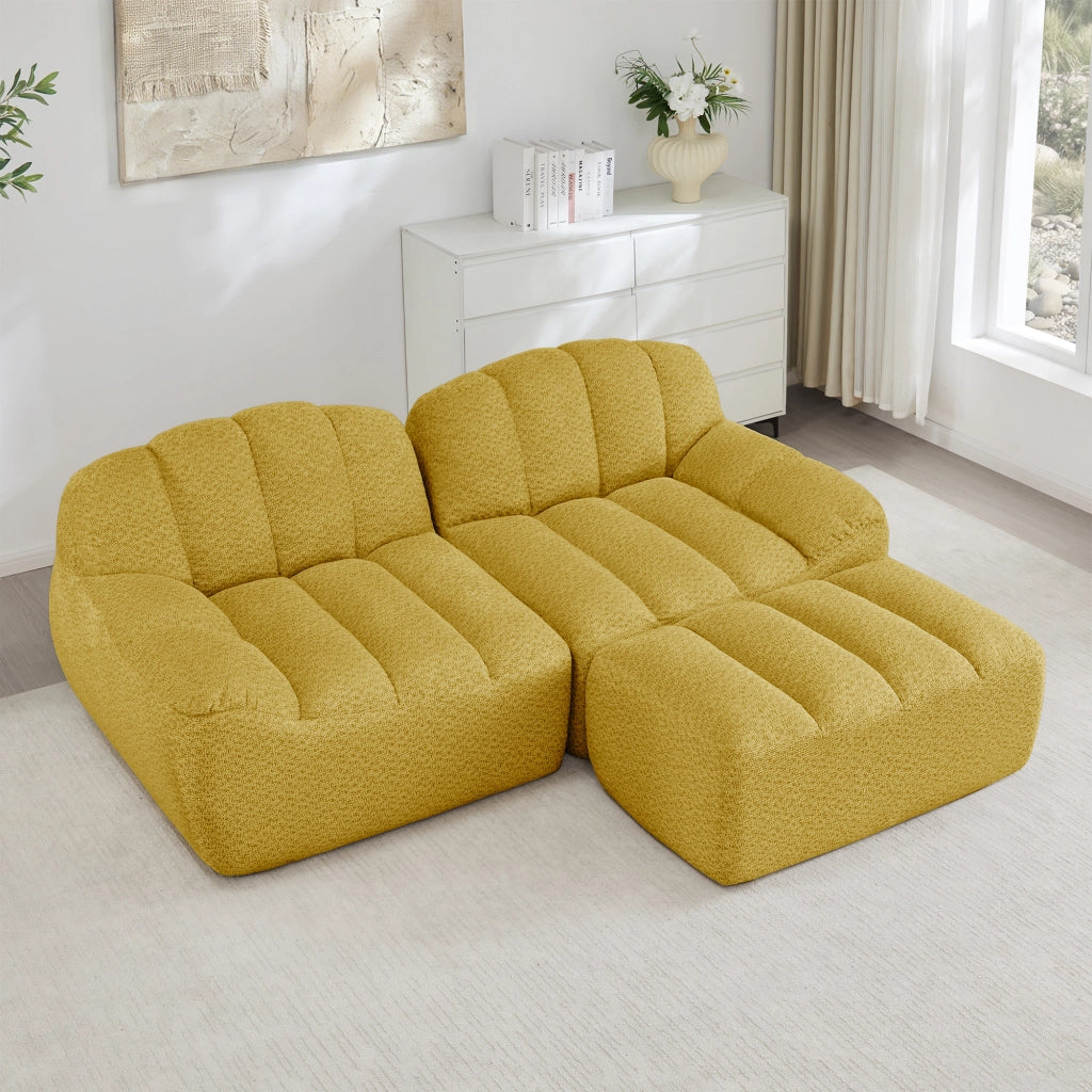Divano angolare modulare senza struttura con seduta ampia e pouf per soggiorno in pile granulato giallo 210 × 165 × 79 cm