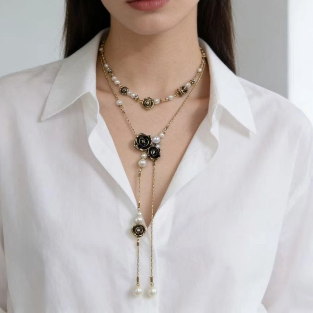 Collana vintage a doppio strato con nappe di perle e rosa
