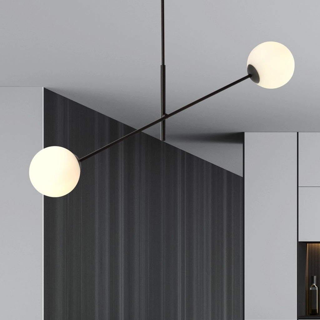 Lampada a sospensione LINEAR con struttura in acciaio nero e sfere in vetro