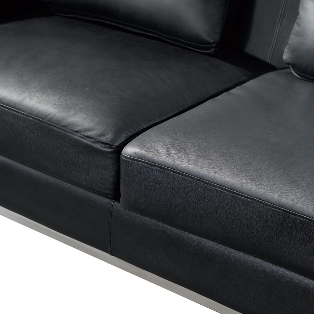 Divano ad angolo rivestito in pelle nera a forma di L con orientamento versione destra