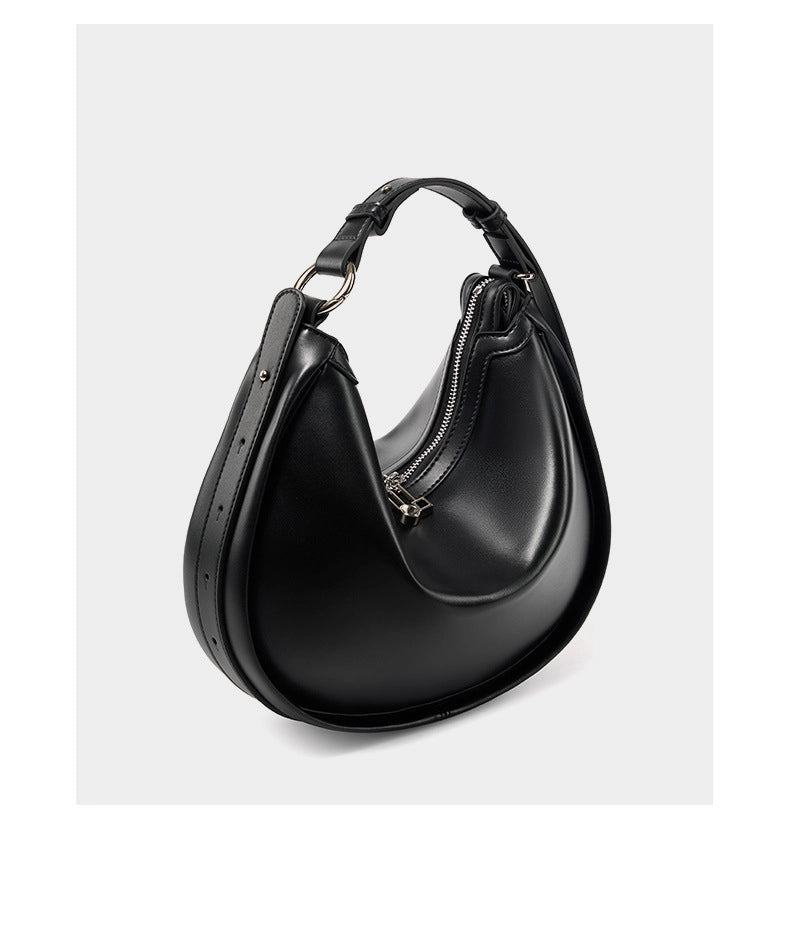 Borsa da donna alla moda in vera pelle, colore nero.