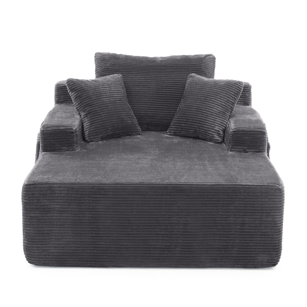 Divano compatto in corduroy grigio scuro con tasche laterali e cuscini inclusi