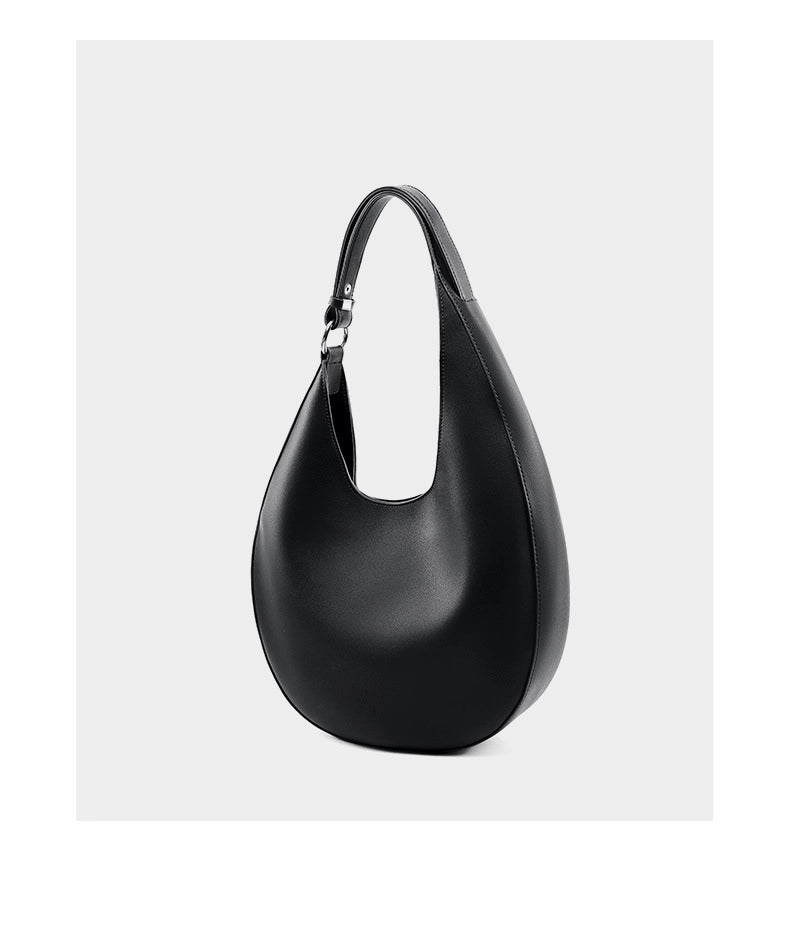 Borsa a tracolla da donna in vera pelle, modello hobo alla moda, colore nero.