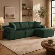 Divano modulare in velluto a coste verde smeraldo con chaise longue