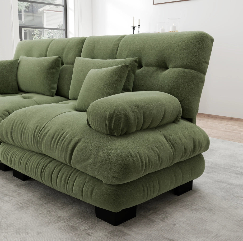 Divano modulare con ottomane mobili in chenille verde; configurazione a U o angolare