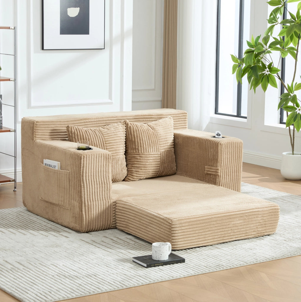 Divano pouf in velluto a coste kaki con tasche laterali e 2 cuscini; 151 x 133 x 64 cm