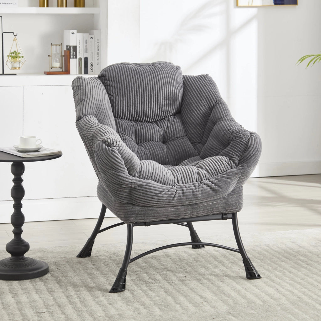 Poltrona lounge grigia con pouf e tasca laterale