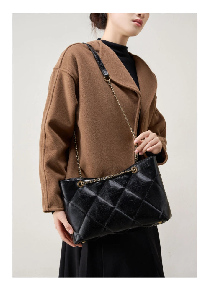 Borsa a tracolla da donna in vera pelle, colore nero.