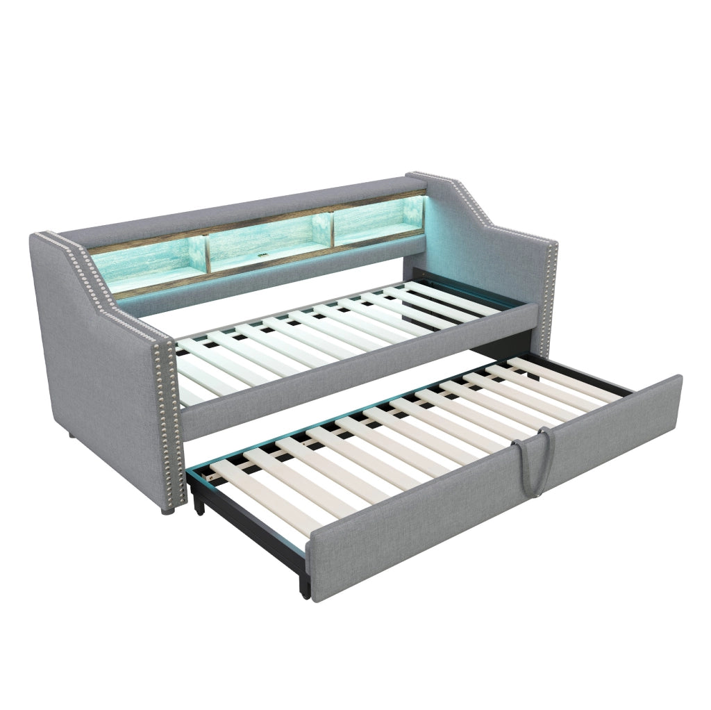 Divano letto imbottito estraibile 90/180 x 190 cm con vani portaoggetti; LED e USB; grigio chiaro
