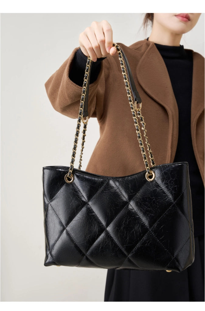Borsa a tracolla da donna in vera pelle, colore nero.
