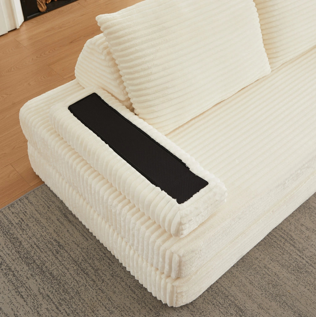 Divano modulare ULEVR 211,5 cm in velluto a coste beige con schienali triangolari e braccioli mobili