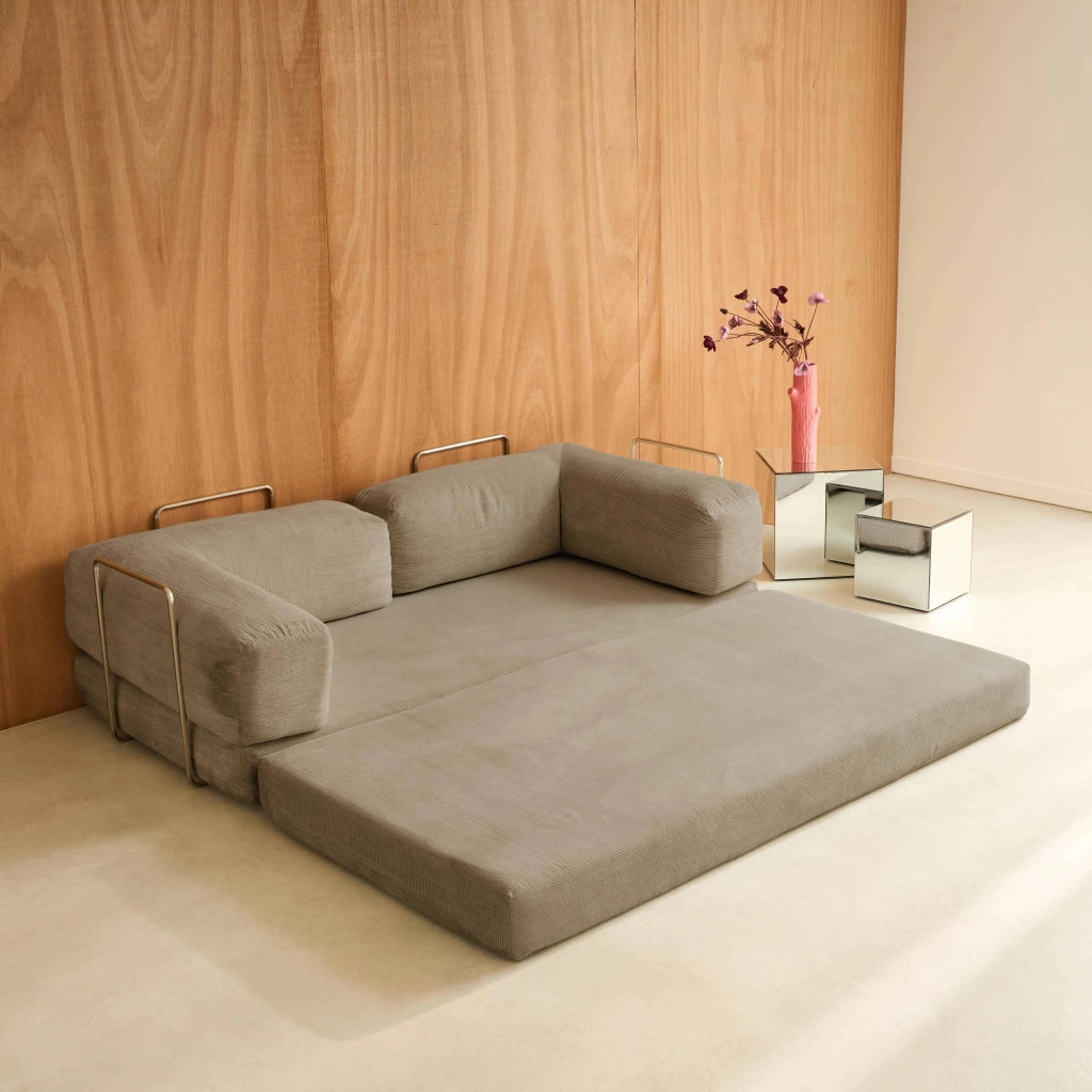 Divano letto futon in velluto a coste e struttura cromata, talpa