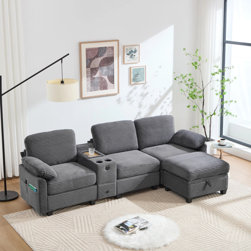 Divano con memory foam console scorrevole USB-C tasche laterali e pouf contenitore in velluto a coste grigio scuro