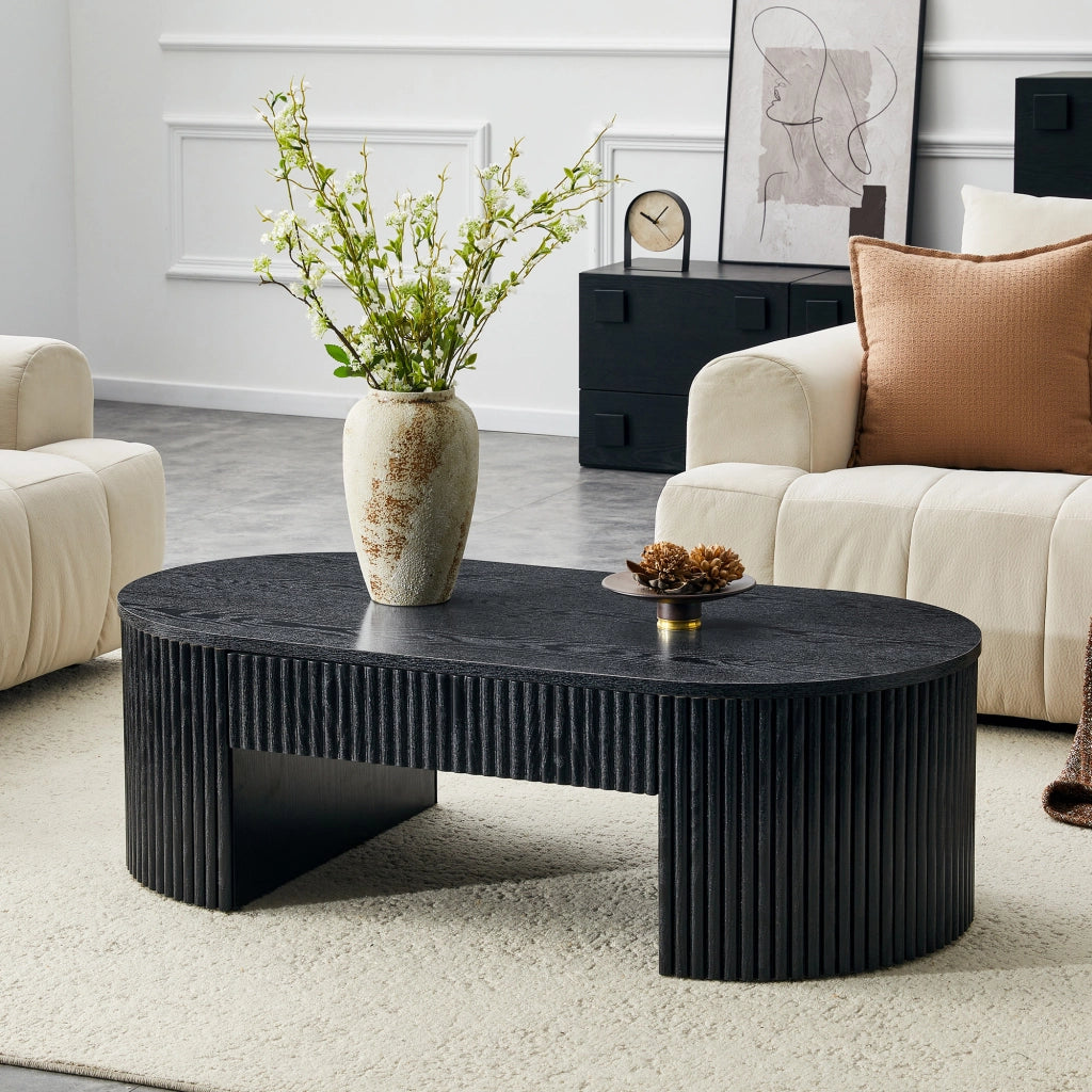 Tavolino basso ovale con cassetto e vano aperto, rivestimento a scanalature, per soggiorno, nero 118 × 65 × 17 cm