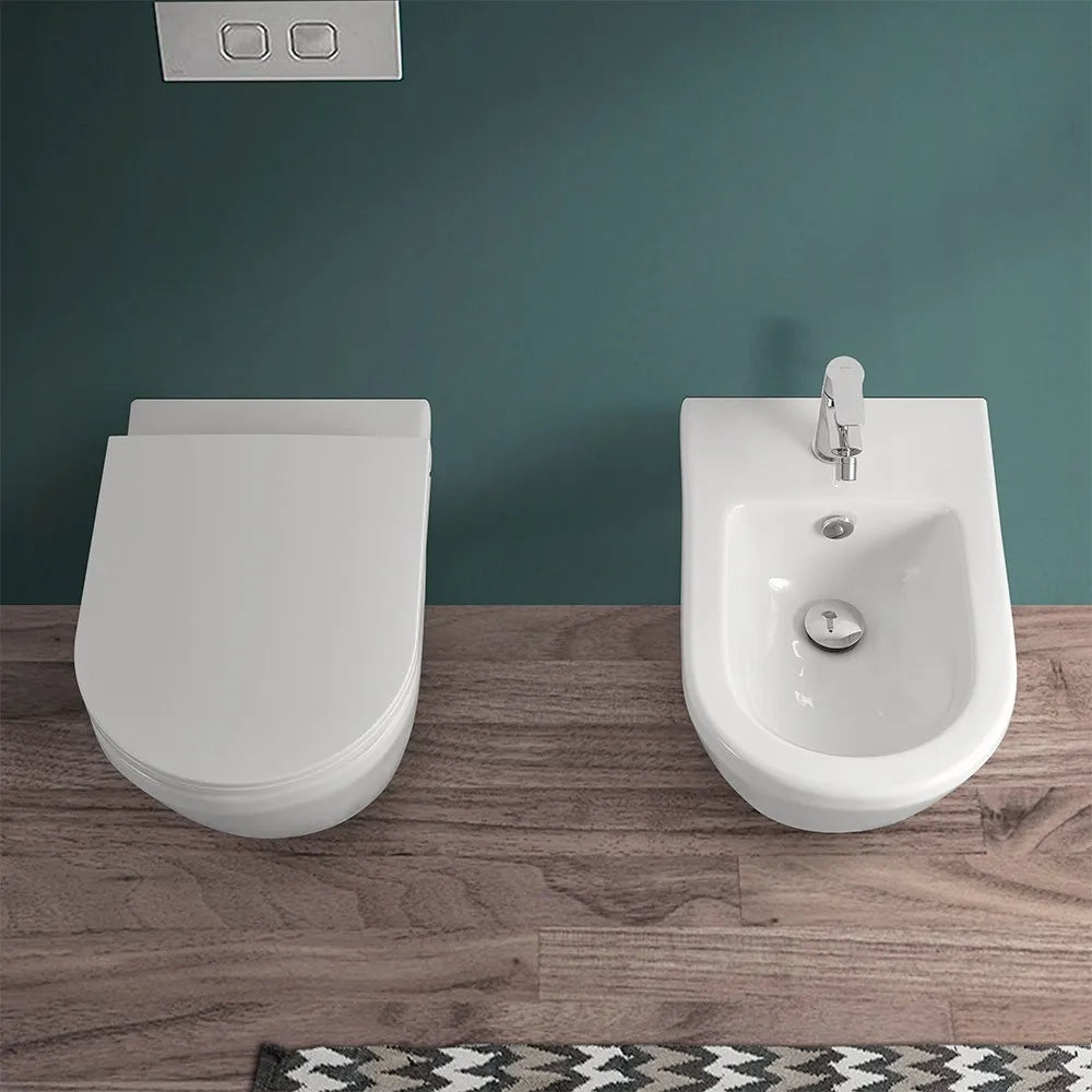 Sanitari sospesi Rimless in ceramica lucida con copriwc soft-close Round