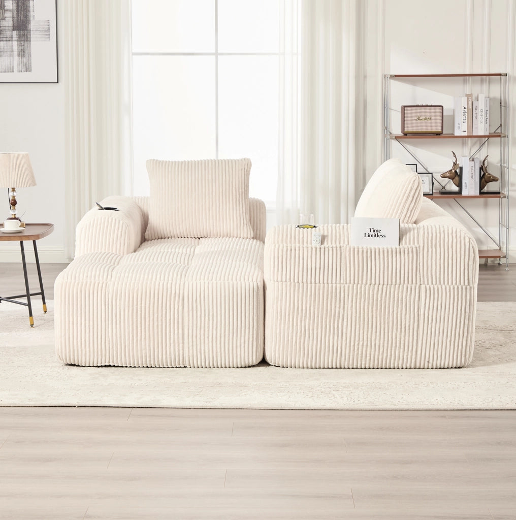 Sofa modulare 253x158x61 cm con sistema DIY; tasche laterali e portabevande in cord beige