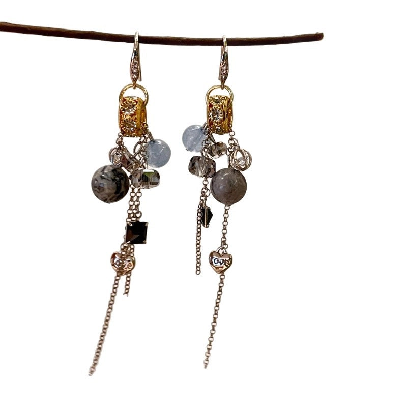 Orecchini vintage con sfera di cristallo blu e nappa