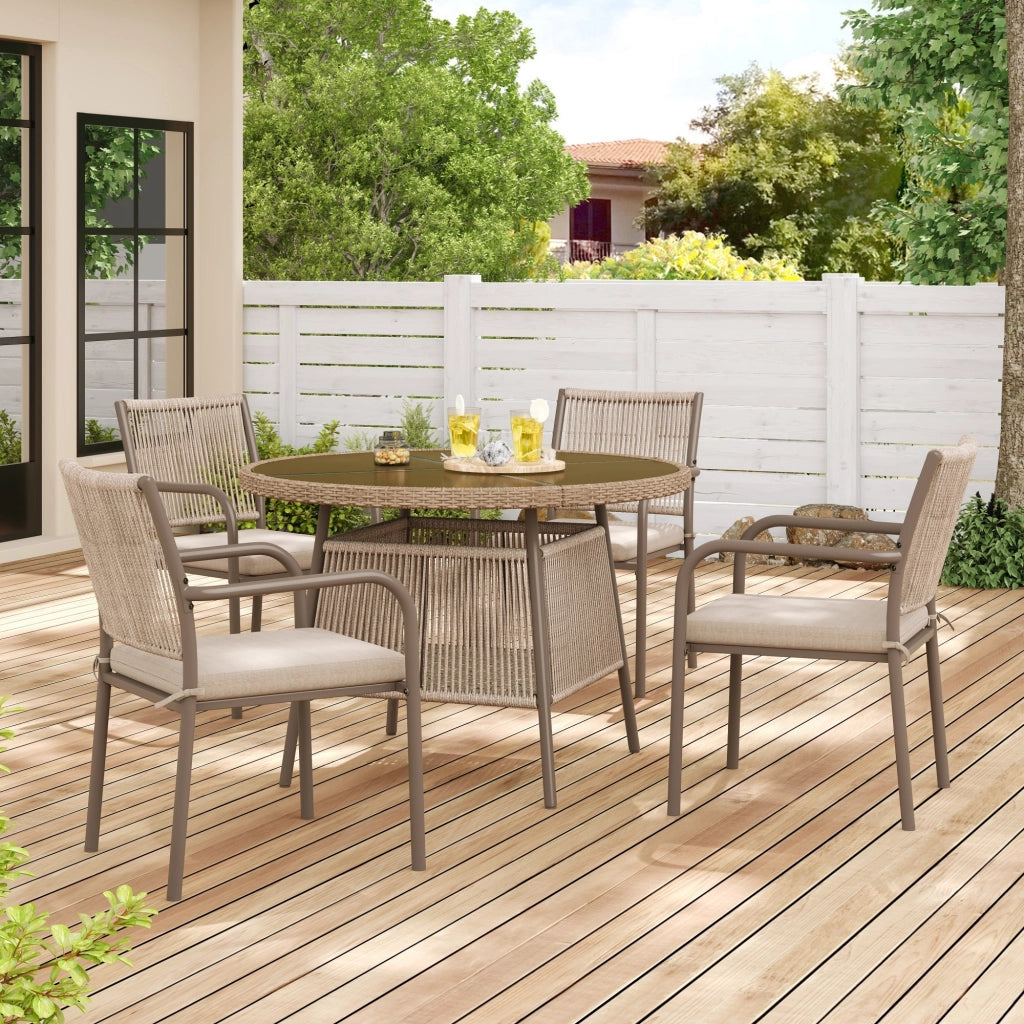 Set salotto polirattan: tavolo rotondo vetro + 4 poltrone; struttura ferro; terrazzo/balcone