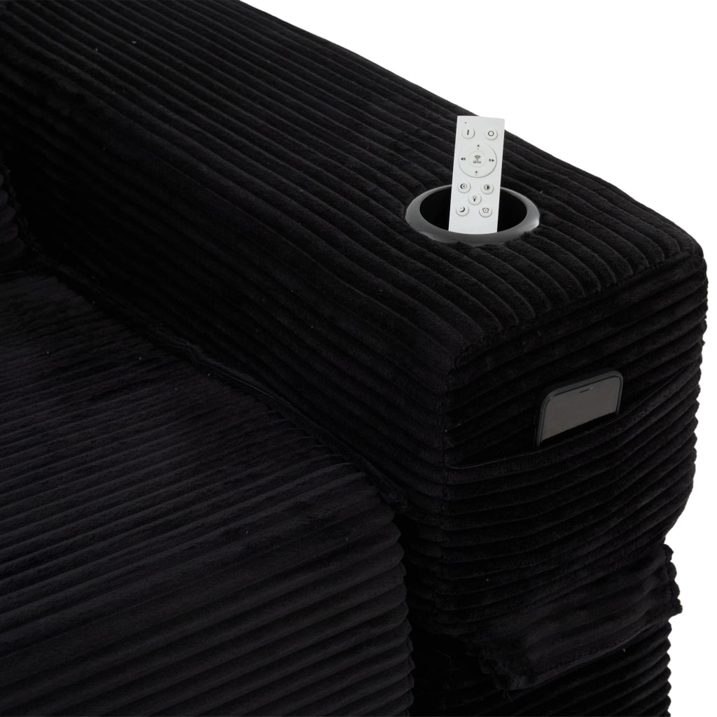 Divano convertibile in velluto a coste con molle, cuscini in memory foam, tasche laterali e portabicchieri nero