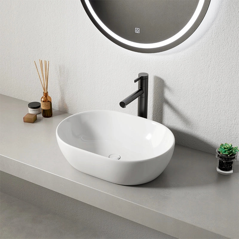 Ampio lavabo ovale in ceramica bianca lucida da appoggio, 49 x 35 cm