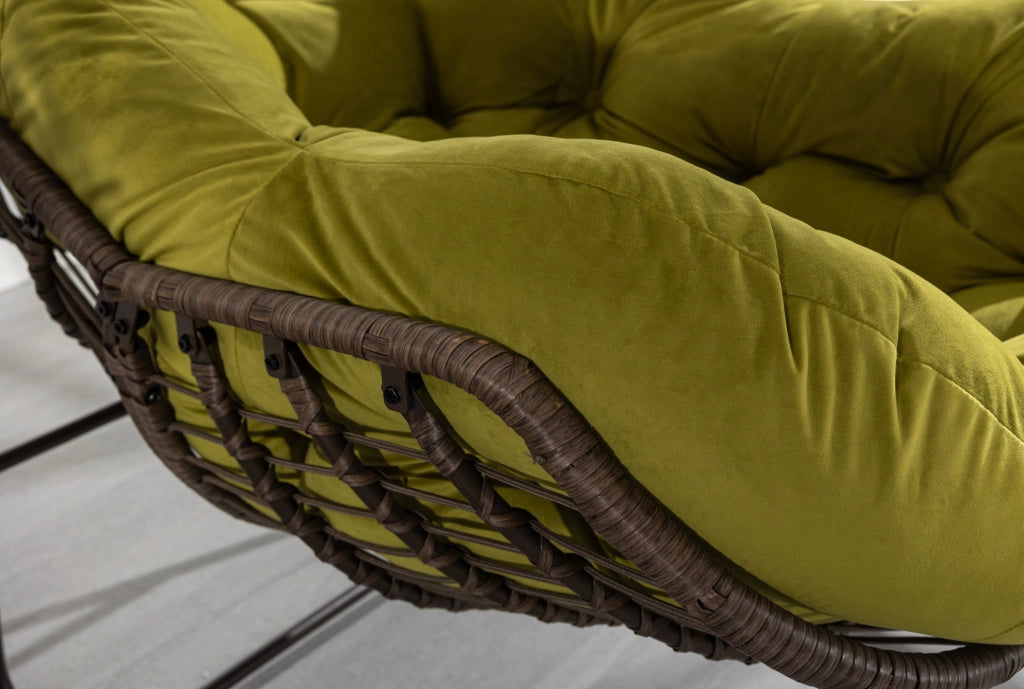 Sedia a dondolo in rattan sintetico con cuscino imbottito, oliva