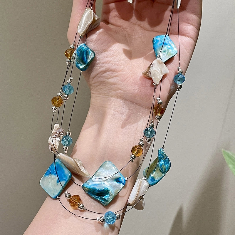 Collana di perline di conchiglia di cristallo dalla forma irregolare