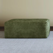 Pouf ottomano in tessuto effetto corduroy verde