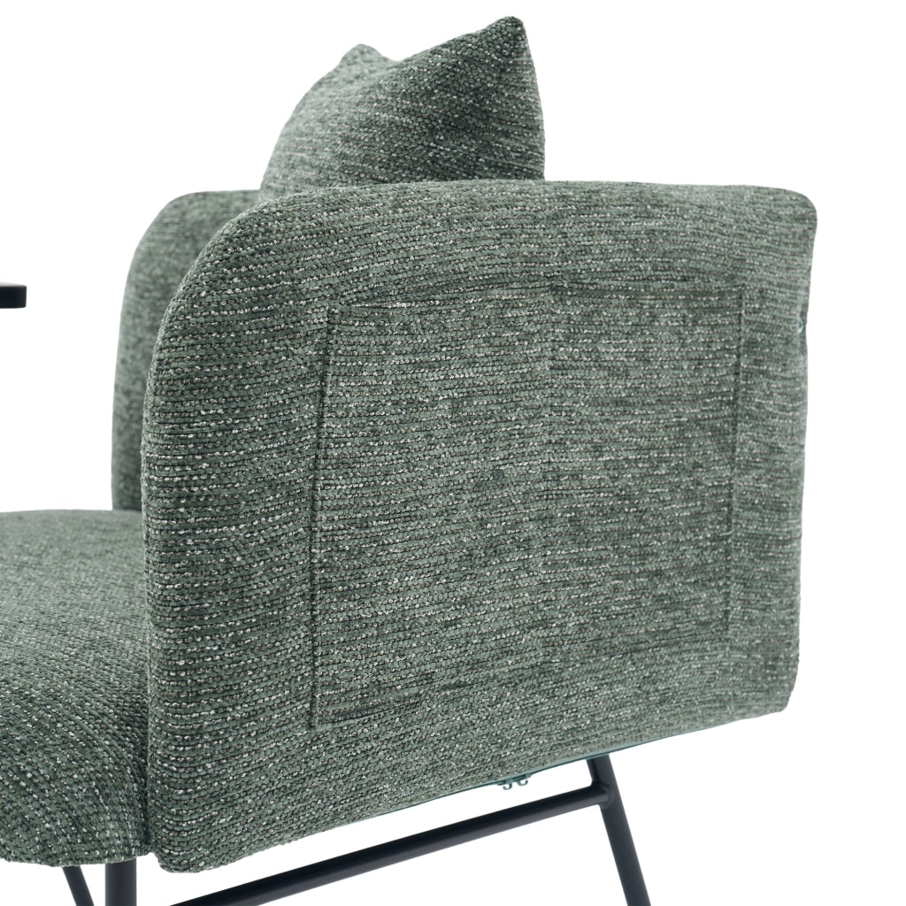 Poltrona moderna in chenille color smeraldo con tavolino laterale e tasche portaoggetti