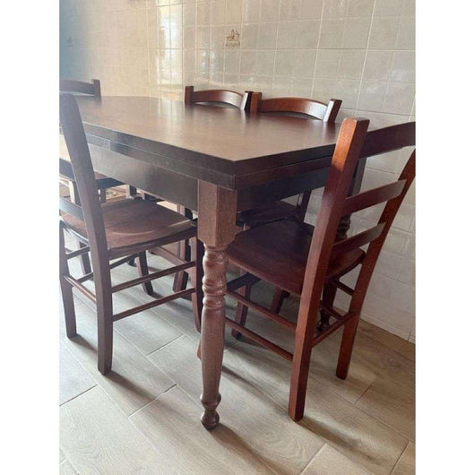 Tavolo arte povera con gambe tornite allungabile fino 220 in legno massello e mdf con rifinitura in noce 140x80x78 H