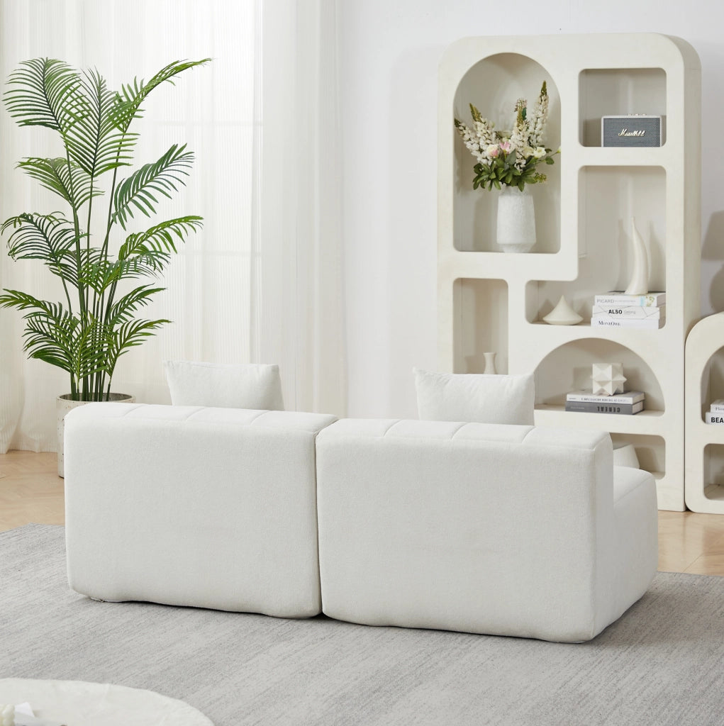 Modulo divano in chenille con forma curva e due cuscini per soggiorno e ufficio